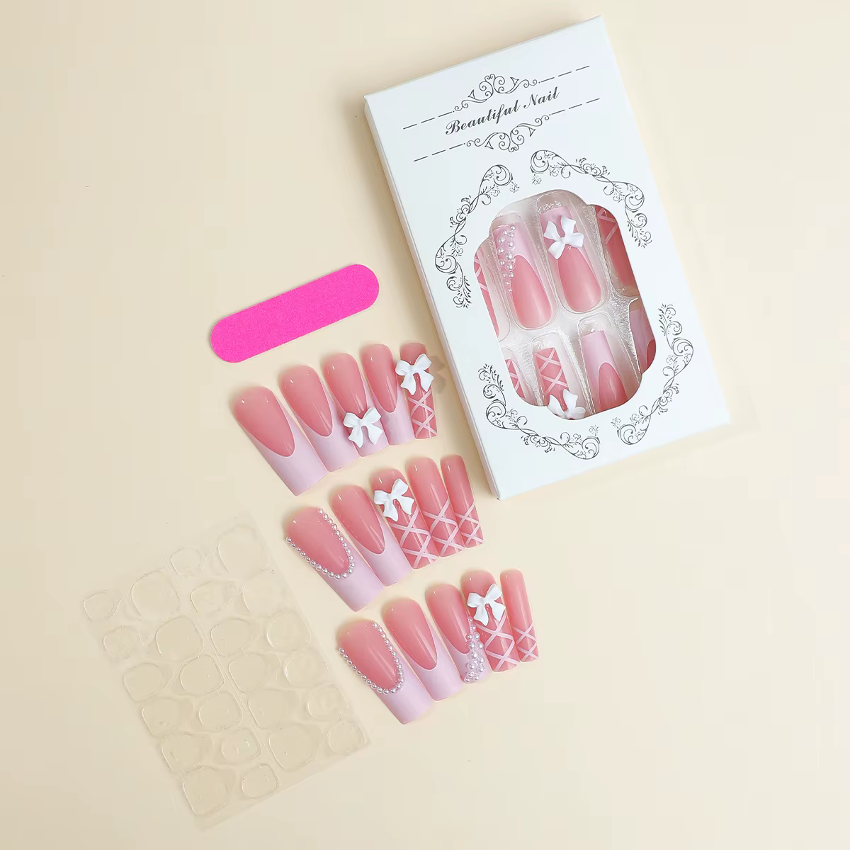 Faux ongles décoratifs avec nœud blanc