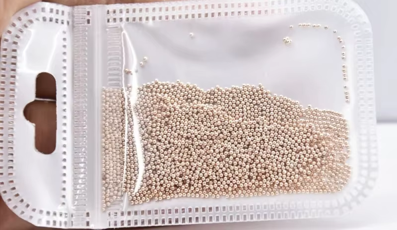 Perles pour Nail Art en acier inoxydable or/argent