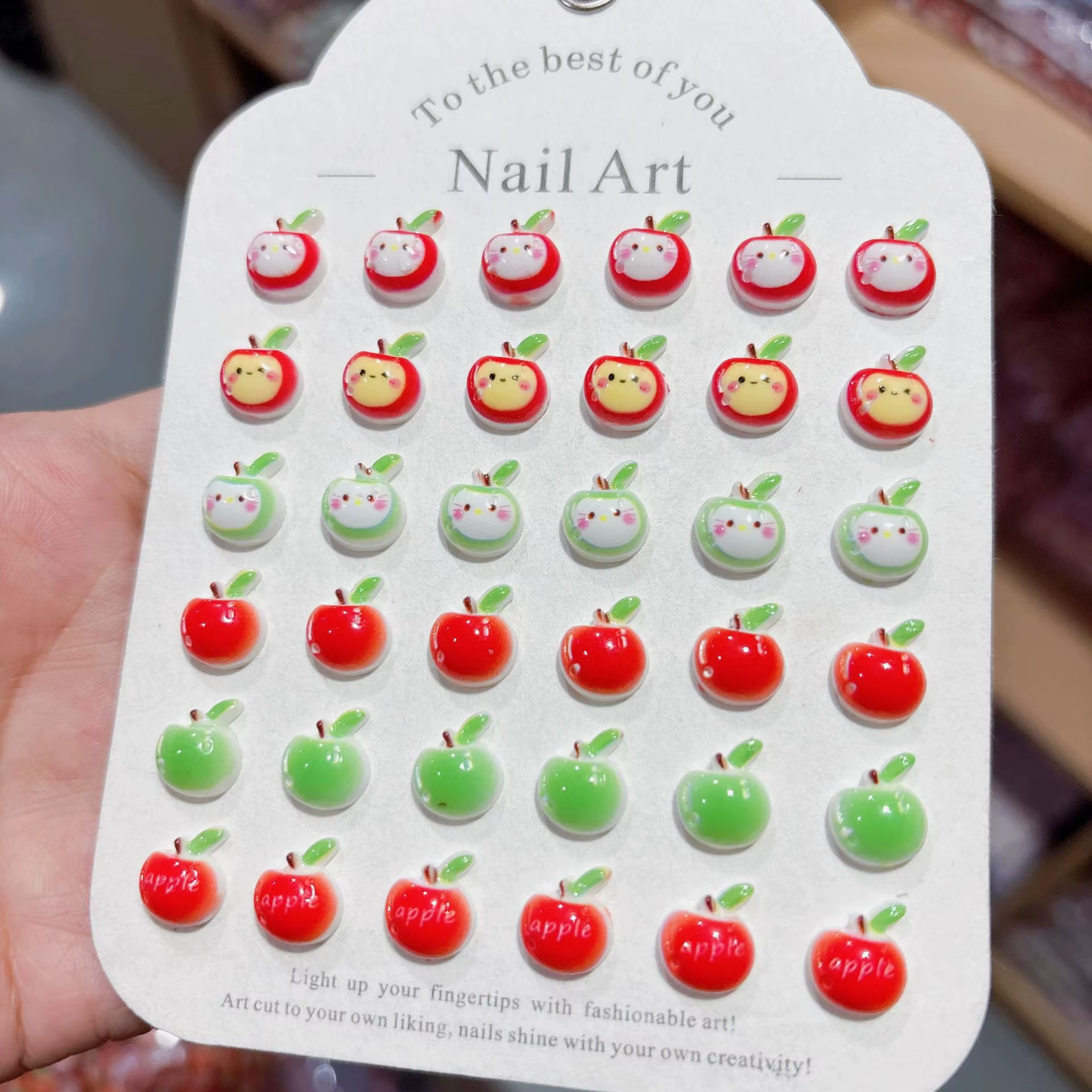 100 pièces/paquet de breloques pour ongles en forme de pomme de dessin animé 9×12mm - Décorations d'ongles en résine