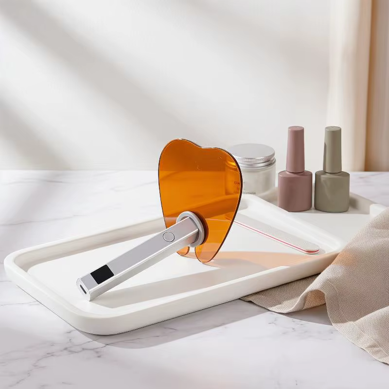 Plaque de protection pour lampe à ongles