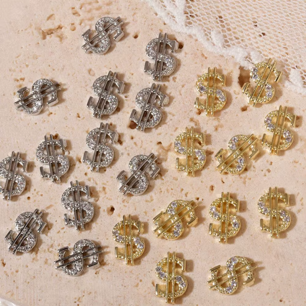 Décoration d'ongles en forme de dollar en argent et or