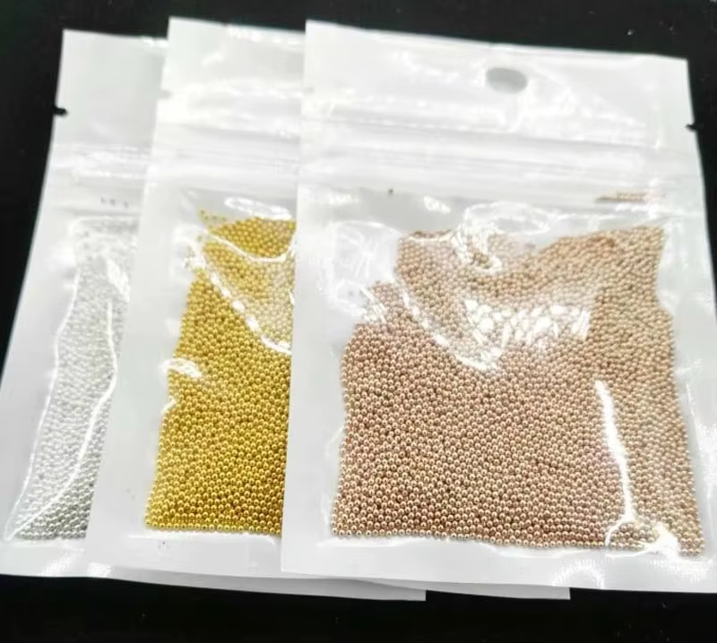 Perles pour Nail Art en acier inoxydable or/argent