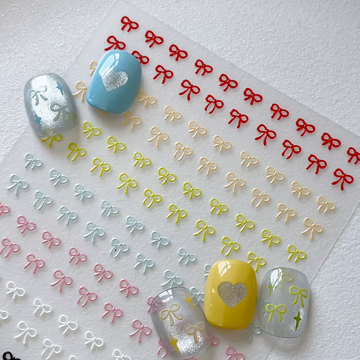 Autocollants pour Nail Art avec nœuds colorés en relief